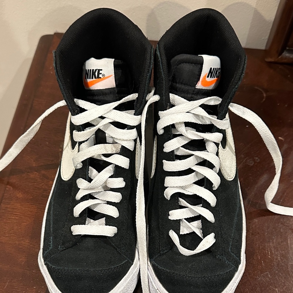 Nike Black and White High-Tops with Orange Accent